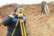 Surveyor works with total station