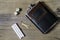 Survival kit flat lay of whiskey flask cigarettes and matches