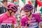 Susa, Italy May 26, 2018: Chris Froome in pink jersey and Elia Viviani in purple jersey speak in first