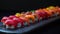 sushi arranged delicately on a sleek black background, accentuating its vibrant colors and exquisite presentation.