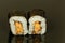 Sushi on a black porcelain background