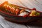 Sushi boat on wooden background.