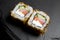 Sushi bonito roll on a dark background. Top view of sushi . Sushi food photo for menu