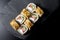 Sushi bonito roll on a dark background. Top view of sushi . Sushi food photo for menu