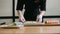 Sushi chef preparing rolls using a bamboo mat