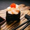 Sushi gunkan with prawn and caviar, delicacy food