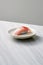 Sushi on marble plate on marble table