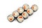 Sushi mini roll with fried sea bass on a white plate, ingredients fried bass, flying fish roe, rice, nori. Traditional Japanese