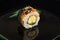 Sushi roll on a black background close-up. Sushi menu. Japanese food concept