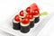 Sushi roll with cherry tomatoes and cheese