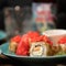 Sushi roll decorated with masago or tobiko caviar. Inside-out Sushi Set. Traditional Japanese food. Healthy Oriental