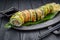 Sushi roll dragon with smoked eel and avocado