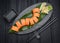 Sushi roll dragon with smoked eel and salmon