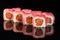 Sushi Roll with salmon and tuna over black background with refl