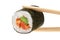 Sushi rolls with avocado, salmon and spicy sauce. Chopsticks.