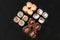 Sushi, rolls on a black isolated background