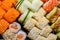 Sushi and rolls pattern background, restaurant delivery close-up. Maki with salmon, unagi, fish healthy meals