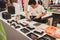 Sushi rolls preparation at Orient Festival in Milan, Italy