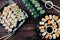 Sushi rolls set on black plates, flat lay