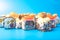 Sushi rolls with tobiko, cheese, cucumber, mussels and save sauce, on a blue background