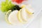 Sushi scallop sashimi with wakame lemon and salad