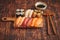 Sushi Set. Different kinds of sushi rolls on wooden serving board