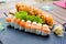 Sushi set roll california shrimp. Japanese traditional fusion cuisine. Delivery food on qurantine. Rice, nori, tiger