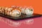 Sushi sets, rolls with caviar, shrimp, tuna and avocado and Philadelphia cheese, on a white plate