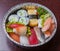 Sushi to go, Nigiri and assorted sushi roll in aluminum foil box