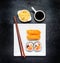 Sushi with Tsukemono and Soy Sauce on White Plate