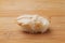 sushi of whelk isolated on cutting board