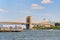 Suspended Brooklyn Bridge across the East River between the Lowe
