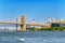 Suspended Brooklyn Bridge across Lower Manhattan and Brooklyn. N