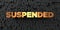 Suspended - Gold text on black background - 3D rendered royalty free stock picture