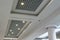 Suspended and grid ceiling with halogen spots lamps and drywall construction in empty room in store or house. Stretch ceiling