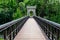 Suspended metallic bridge in Nicolae Romaescu park from Craiova in Dolj county, Romania, in a beautiful sunny spring day