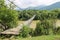 Suspended wooden bridge across Schodnica river