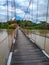 Suspension bridge that crossing Mentarang River, Malinau, outback of Borneo