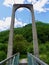 Suspension bridge crossing Verzasca river, Ticino, Switzerland.