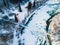 Suspension Bridge in Dwerniczek, Bieszczady Mountains Park in Poland. Frozen San River. Drone View in Winter