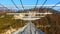 Suspension bridge in skypark Sochi, white rocks