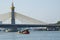 Suspension bridge towering over the water in Bangkok with beautiful views