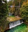 Suspension footbridge across gorge with waterfalls and cascades in Kranjska Gora, Slovenia