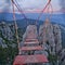 Suspension red bridge on Ai-Petri cliffs. Crimea