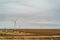 Sustainable Electric power generator windmills overcast sky