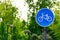 Sustainable transport. Blue road sign or signal of bicycle lane