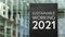 Sustainable Working 2021 sign in front of a modern office building