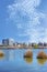 Susuki grass and swan boats on Shinobazu pond of Ueno park during sakura festival.