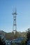 Sutro tower with blue and white gradient sky in the city districts of san francisco california in late afternoon sun and