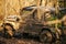 SUV covered with mud on path covered with leaves